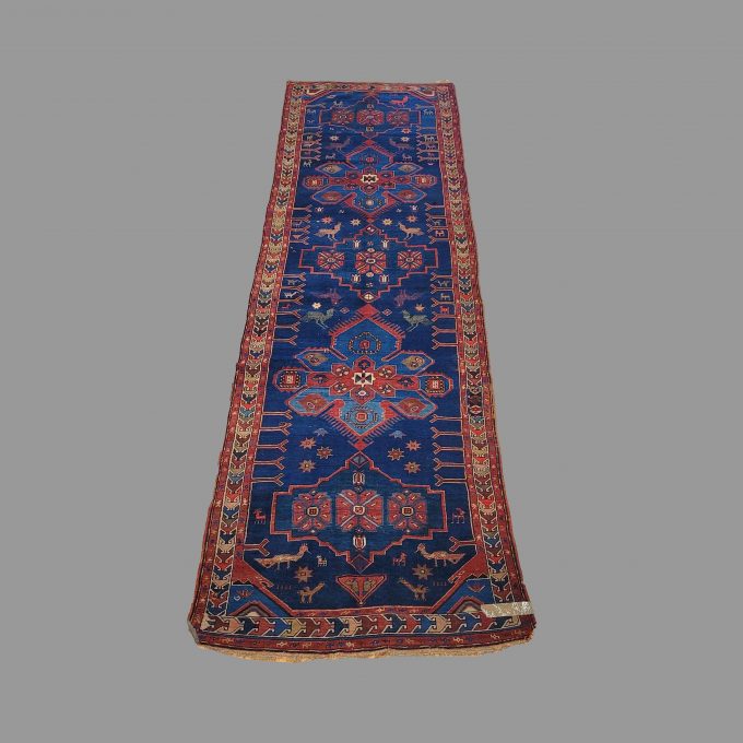 Los 819: Kazak, um 1930, 430 x 125 cm, Zustand C (restauriert)